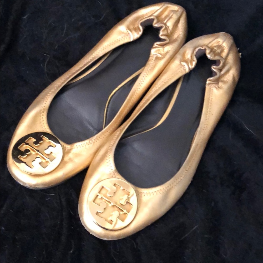 Tory Burch Reva ballet flats in gold.